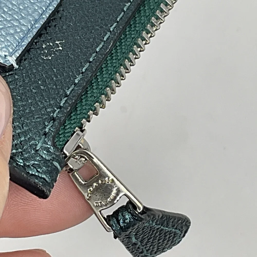 Coach zip top